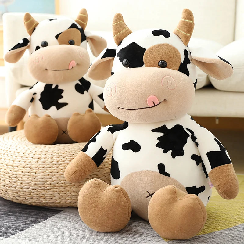 Charming baby cow stuffed animal with big eyes and a soft, plush body, ideal for hugs and imaginative play.