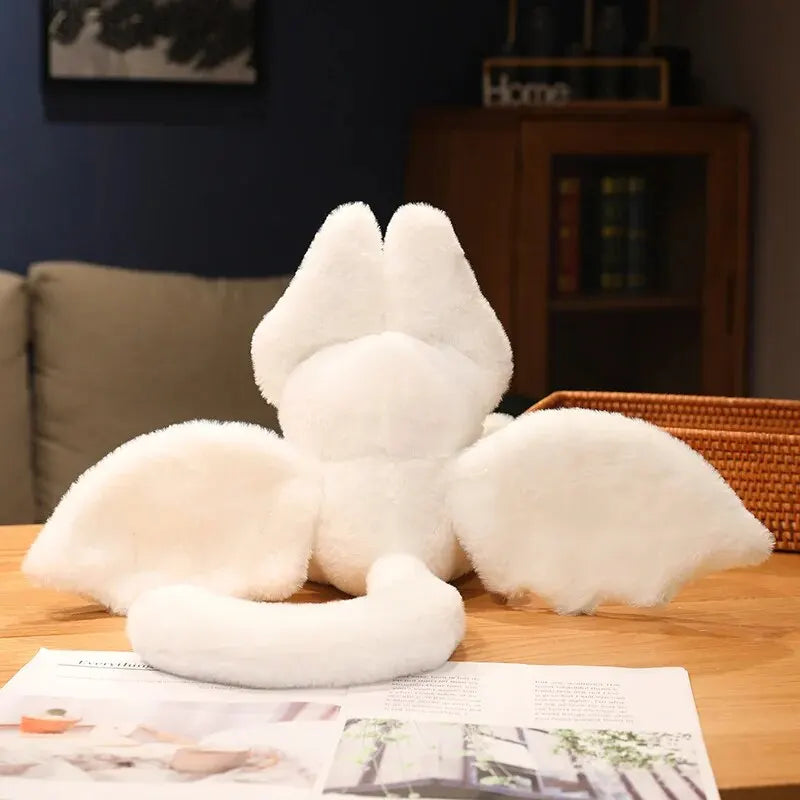 Adorable plush white bat with soft fabric and oversized ears, perfect for cuddling and adding a charming touch to your Halloween decor