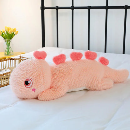 Kawaii-style giant pink dinosaur pillow featuring bright colors and adorable details, perfect for brightening up any child's space