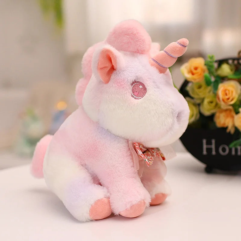 Lovable rainbow unicorn plush featuring a soft, huggable body and vibrant colors, perfect for enhancing any toy collection