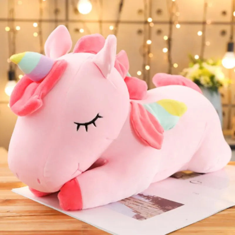 Magical huge unicorn plush in white and pink, perfect for gifting during the holiday season, adding a touch of enchantment to any celebration.