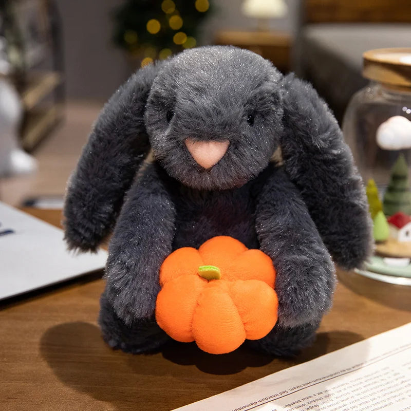 Charming plush toy of a cute rabbit peeking out from a colorful pumpkin, ideal for bringing a whimsical and festive vibe to your Halloween celebrations