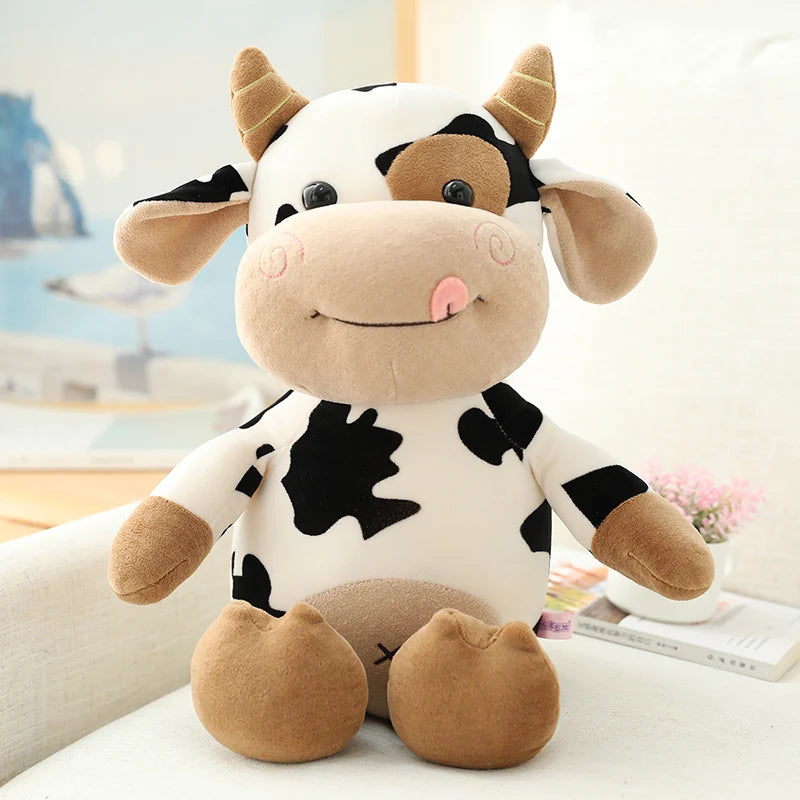 Sweet cattle plush animal with a gentle expression and cuddly design, ideal for snuggles and companionship