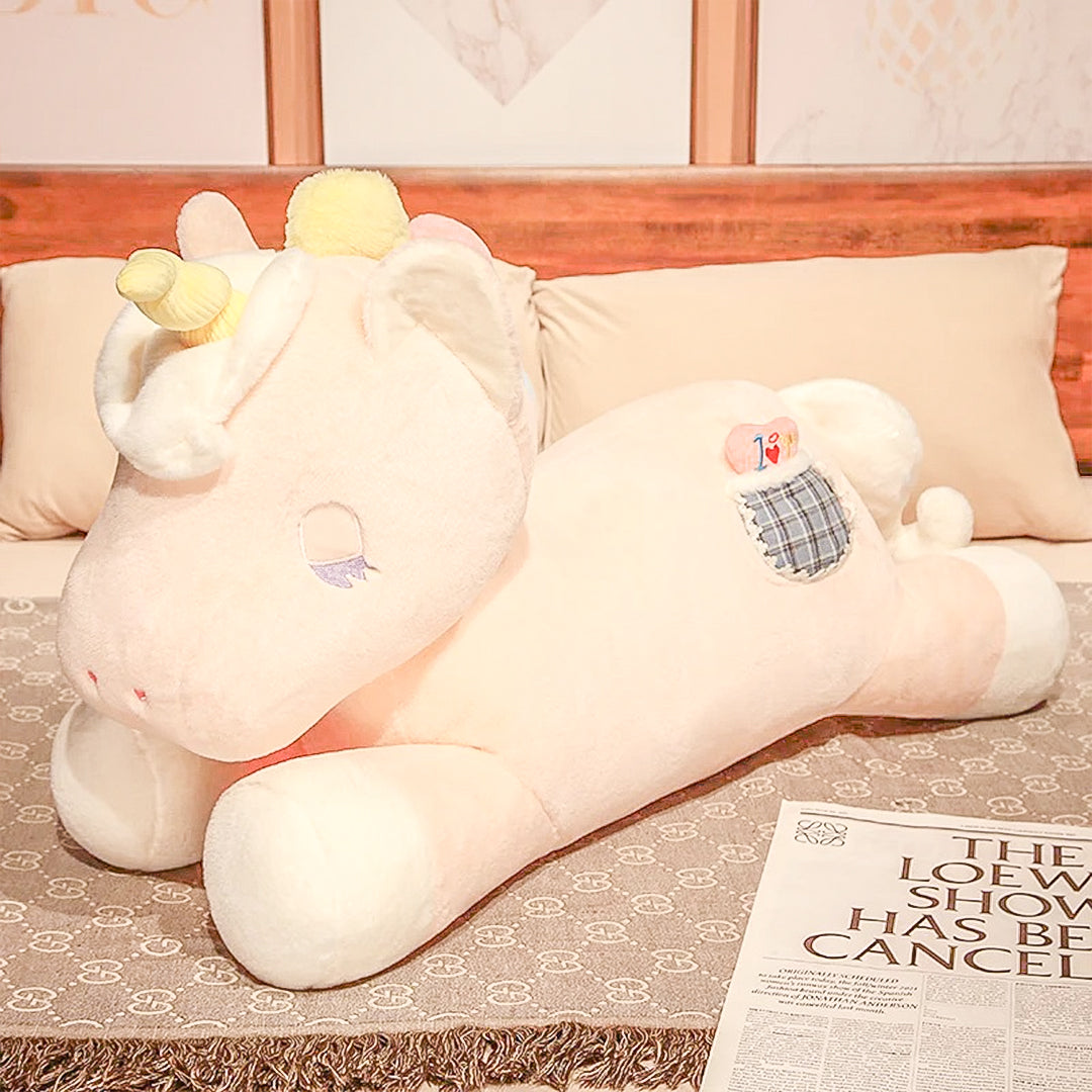 Close-up of a cuddly gigantic unicorn plush toy showcasing its soft fur and playful expression, perfect for snuggling